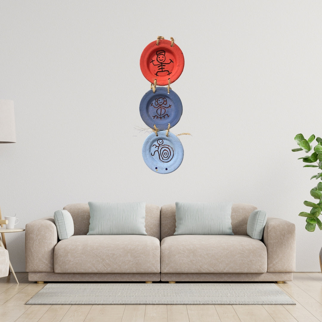 Platos de pared adornados con símbolos taínos: capturando el arte taíno