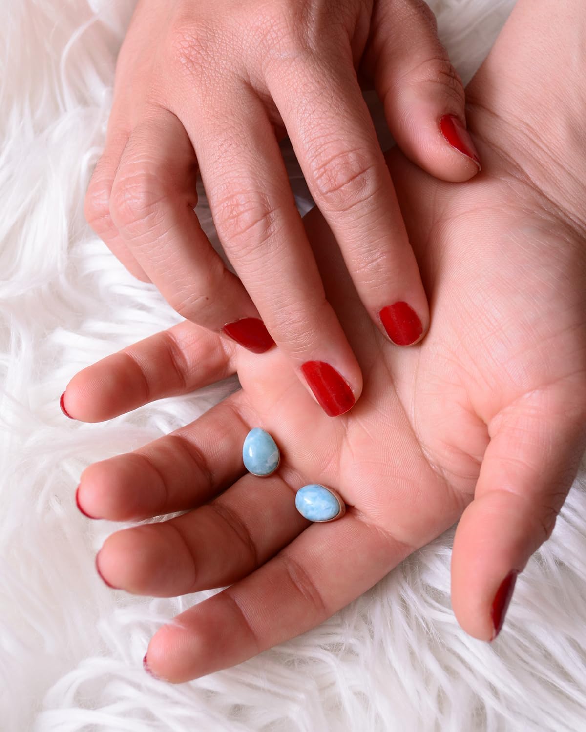 925 sterling silver sleeper-style earrings with natural Larimar tear drops, handcrafted artisanally. With push-back or butterfly closures